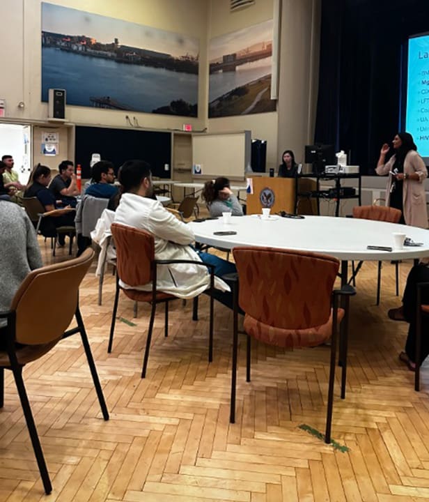 Professor teaching in front of a class